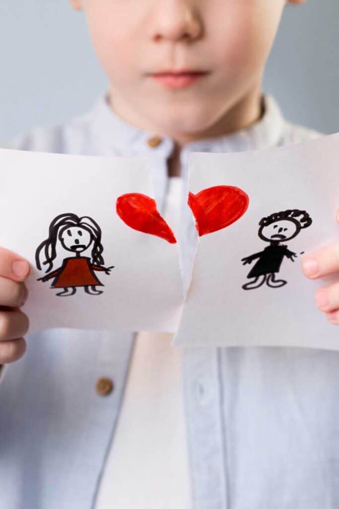 child holding a broken relationship art