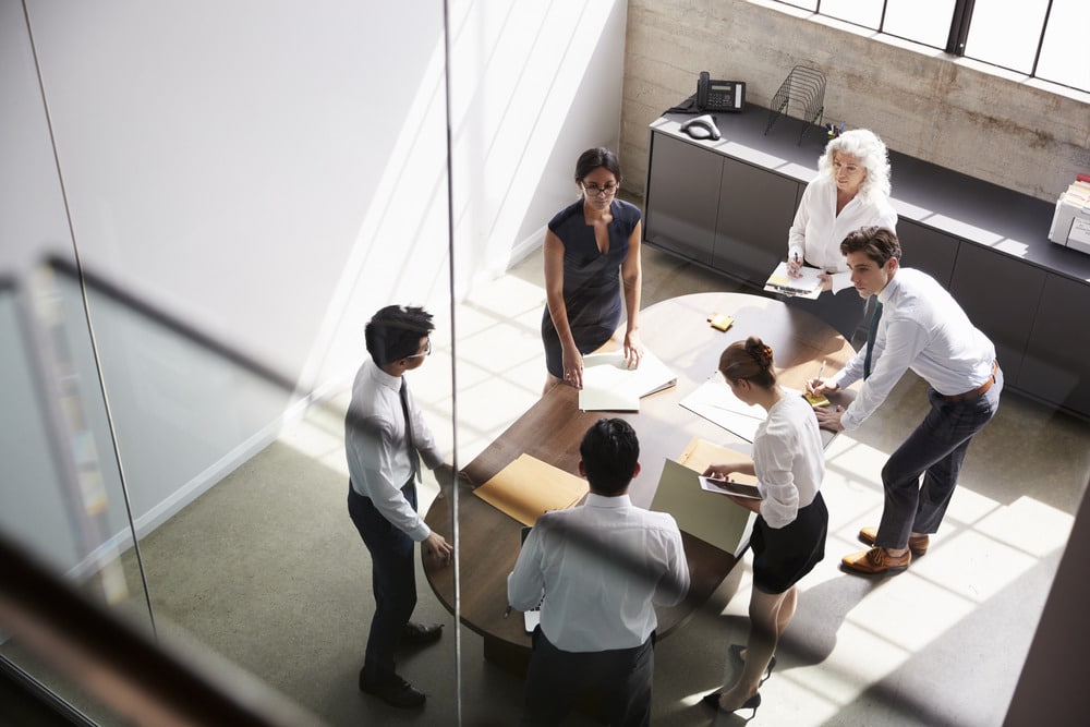 people in the office supporting each other