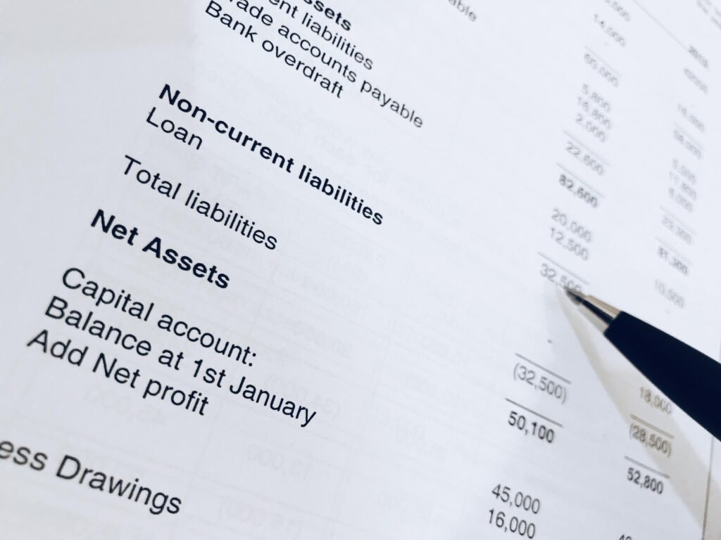 Financial Accounting Report with Pen Close Up