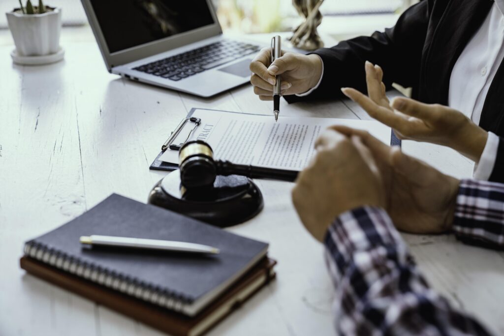 Lawyers give advice about judgment, agreements, Consultation of Businesswoman and Male lawyer or judge counselor having team meeting with client